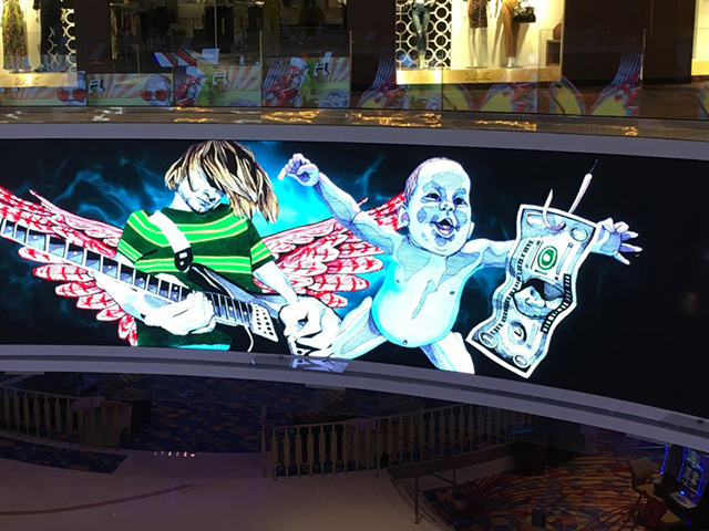 カジノのスクリーンに映し出されたプロモーションビデオの映像